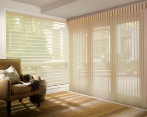 A brown minimalist room with an elegant sheer and blinds by Katandra Interiors Busselton.
