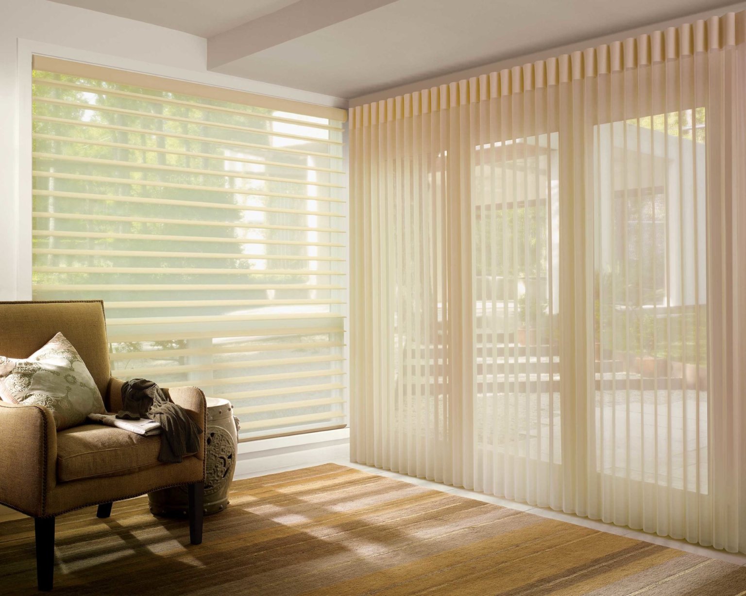 A brown minimalist room with an elegant sheer and blinds by Katandra Interiors Busselton.